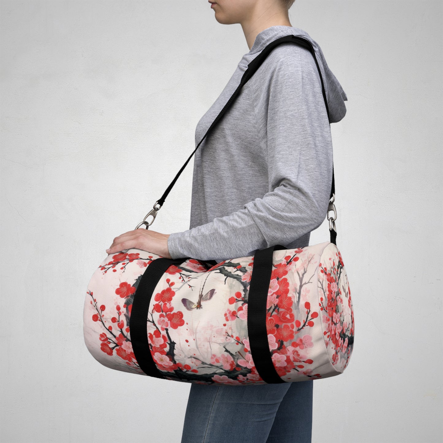 Cherry Blossom Delight: Duffel Bag Adorned with Intricate Flower Drawings and Artistry